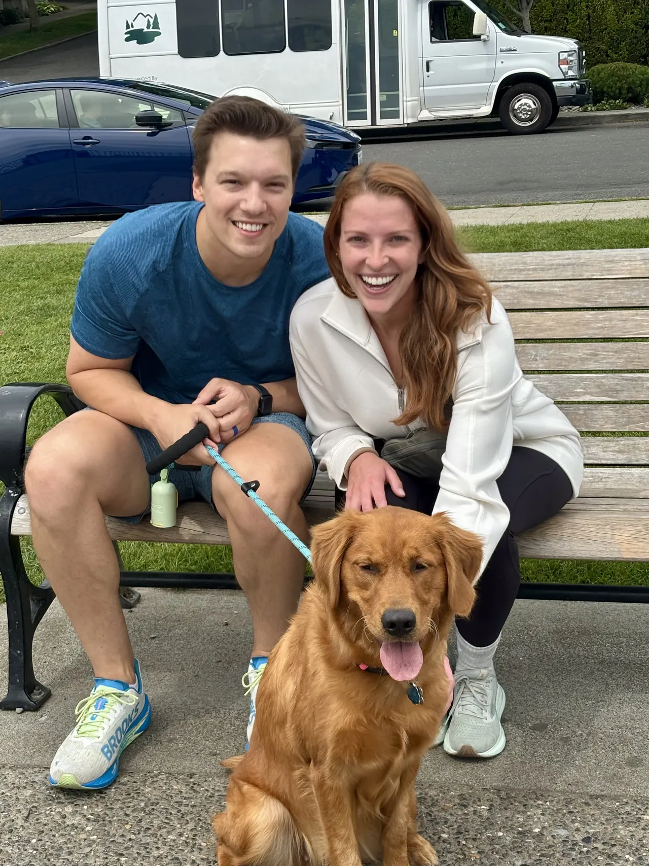 Caroline with her husband and golden retriever, Mable