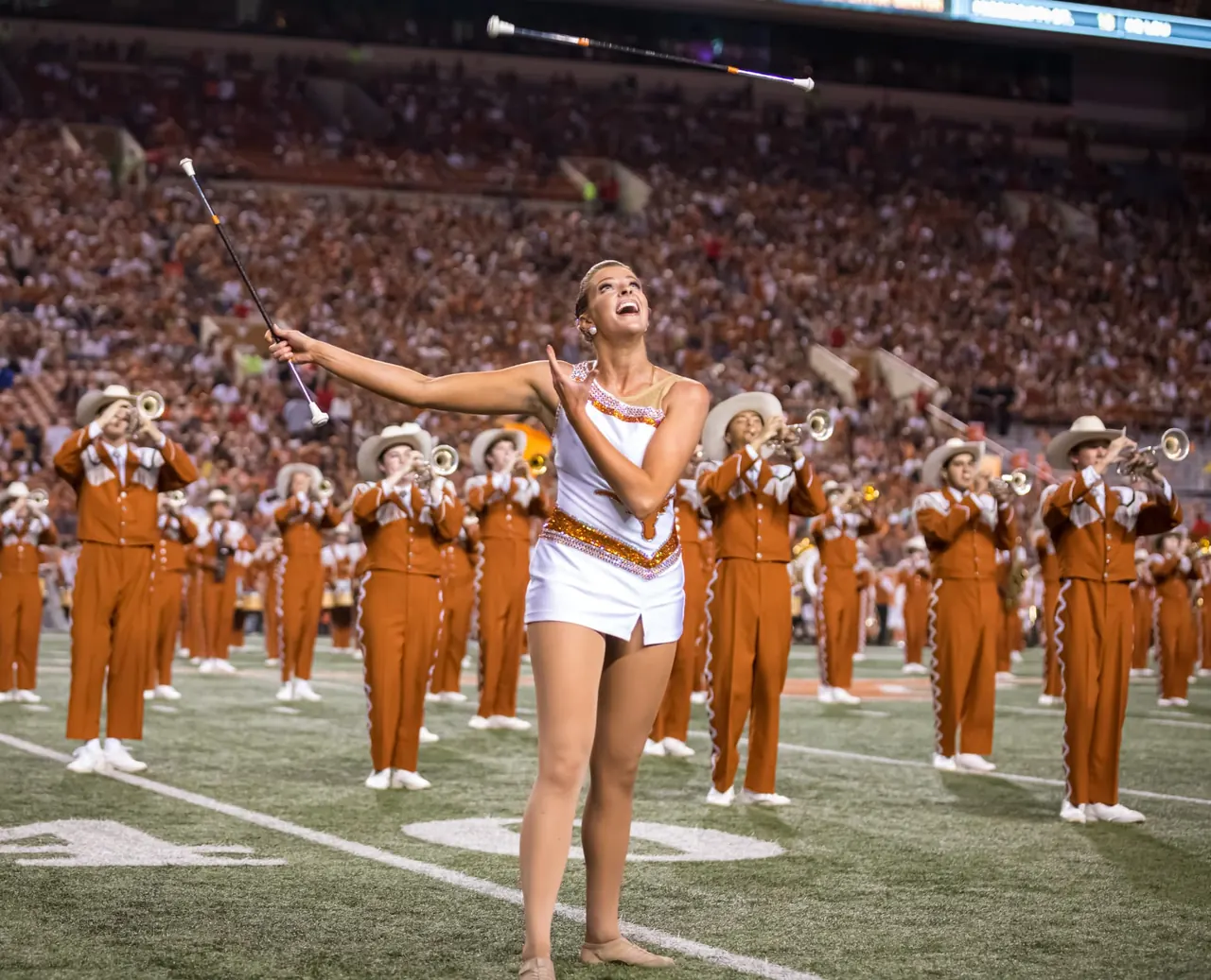 Twirler practicing on the field